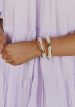 Load image into Gallery viewer, White and Clear Acrylic Bracelet with Gold Accents
